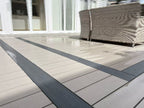 EVERTEX Essence Earth Stone PVC deck with a dark picture-frame border