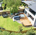 Curved backyard deck built in EVERTEX Essence Gold Teak PVC decking