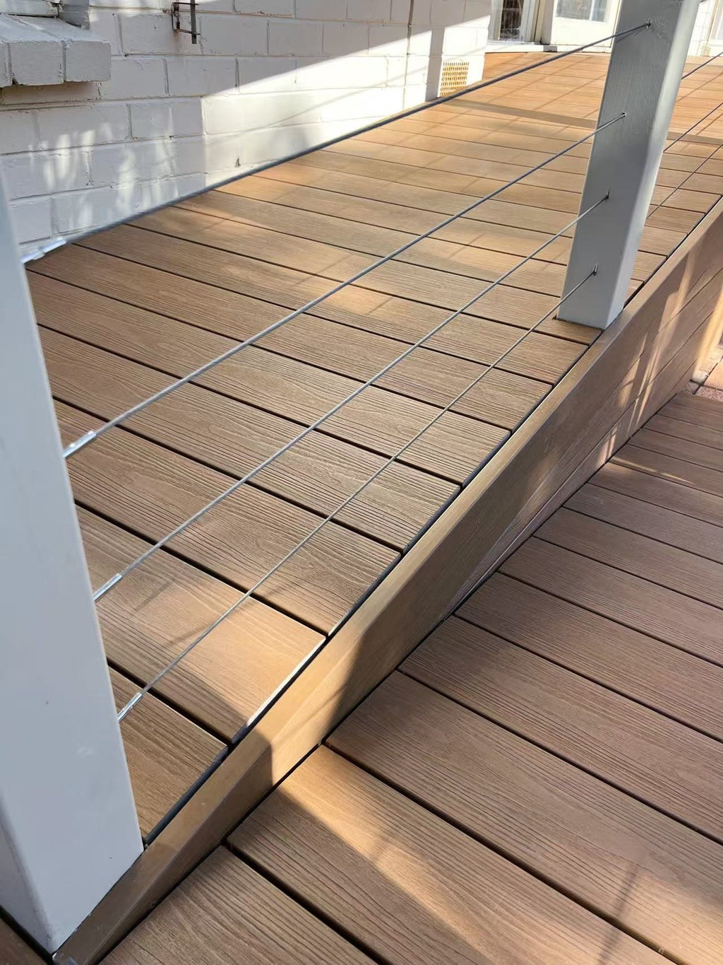 EVERTEX Essence Gold Teak PVC decking on deck steps