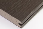 EVERTEX Essence PVC decking board showing the grooved edge and solid PVC core