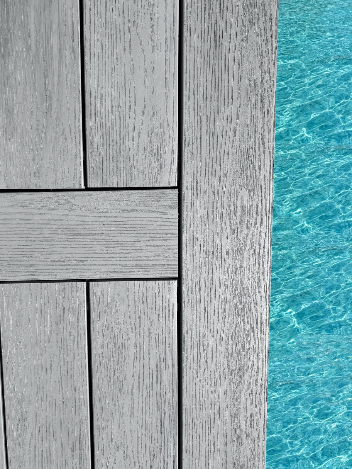 EVERTEX Pioneer Silver Grey PVC decking at a pool edge