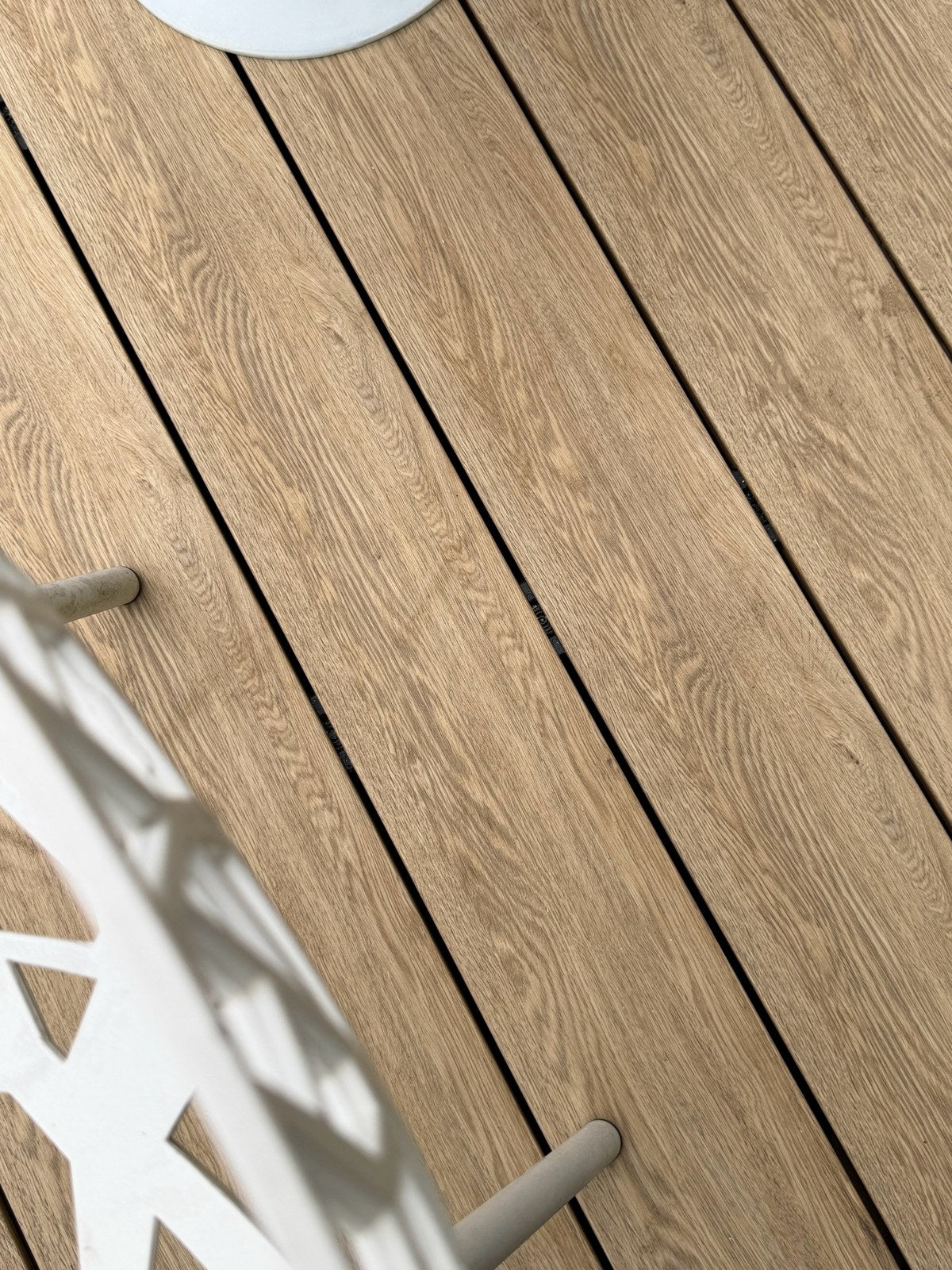 Close-up of EVERTEX VIVID American Oak PVC deck boards